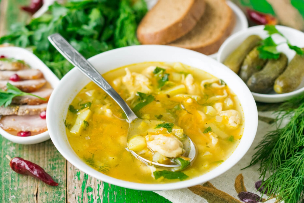 Garlic Dumpling Soup with Pickled Cucumbers