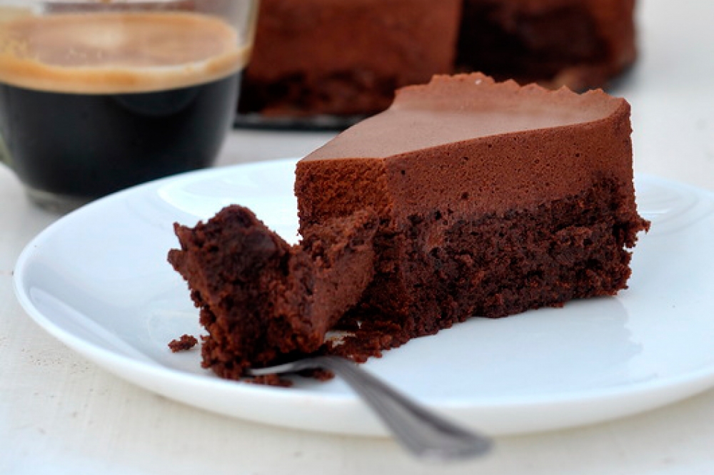 A chocolate cake with chocolate mousse