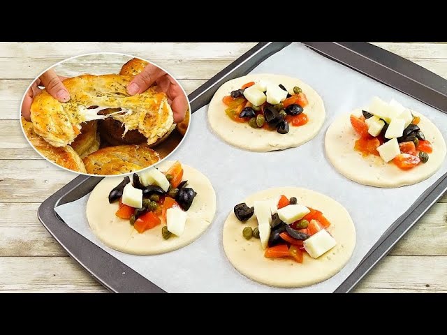 Puff pastry medallions: with olive and tomatoes