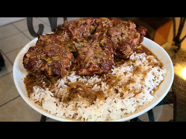 Oxtails Smothered in Gravy Over Rice